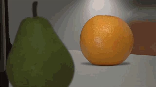 a yellow ball with a face on it is being thrown in the air