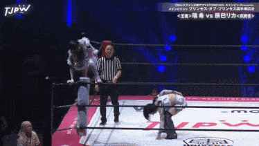 a woman in a wrestling ring with tjpw written on the bottom of the screen