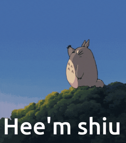 a picture of a totoro with the words hee 'm shiu written below it