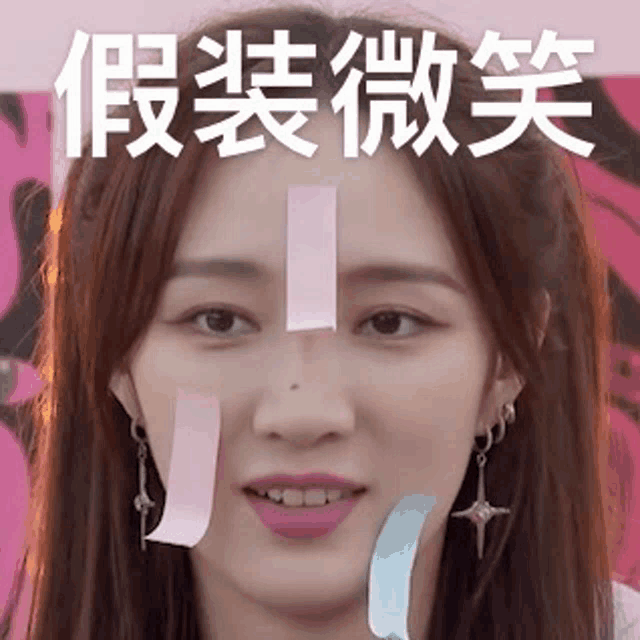 a close up of a woman 's face with sticky notes on it and chinese writing on it .