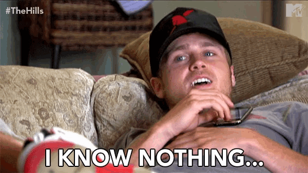 a man laying on a couch with the words " i know nothing " above him