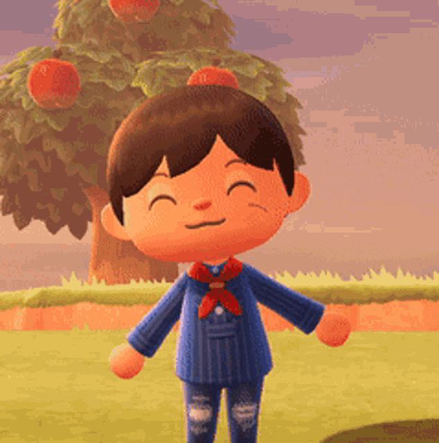 a boy in a blue striped shirt with a red bow tie is smiling in front of an apple tree