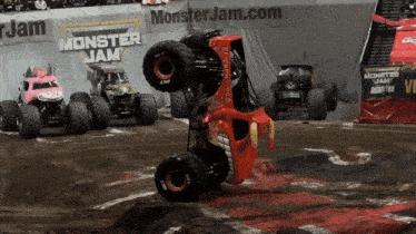 a monster jam sign is in the background of a monster jam event