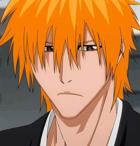 a close up of a man with orange hair