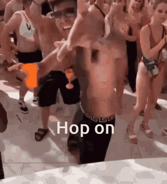 a group of people are dancing and the word hop on is on the bottom right