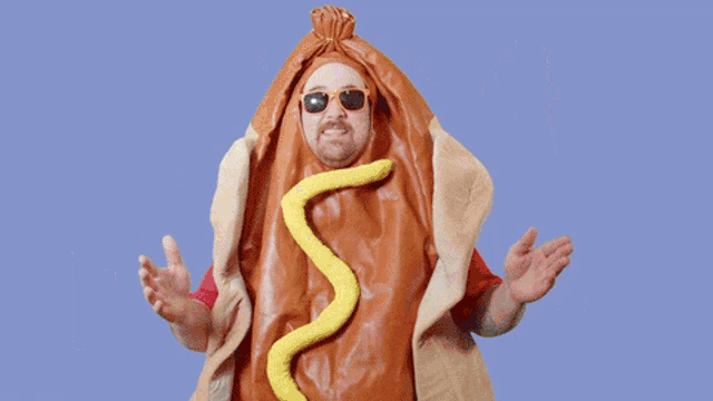 a man in a hot dog costume is surrounded by 100 dollar bills and the words it 's pay day