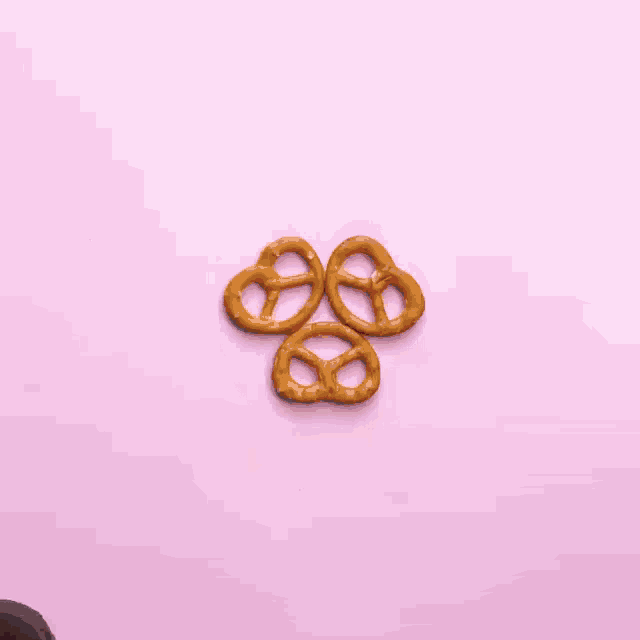 pretzels and chocolate covered pretzels with googly eyes