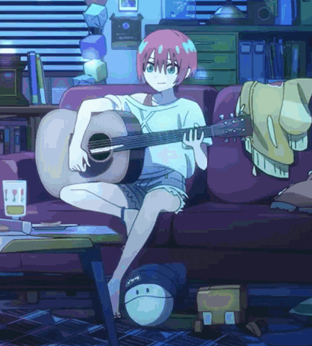 a girl is sitting on a couch holding a guitar and wearing a white shirt that says ' a ' on it