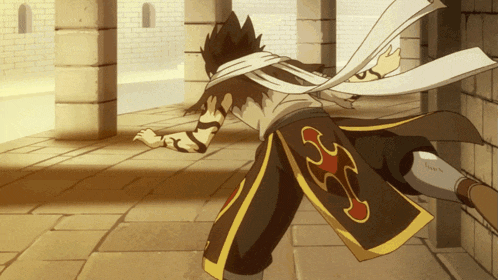 a man in a black and yellow outfit has a flame on the back of his shorts