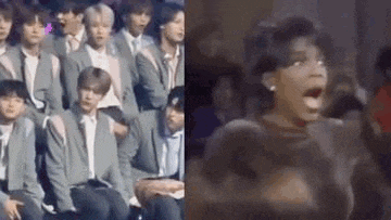 a group of people are sitting next to each other and a woman is standing in front of a crowd .