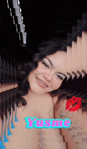 a woman with braces on her teeth and the name yusme written on her chest