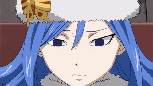 a close up of a girl with blue hair wearing a fur hat