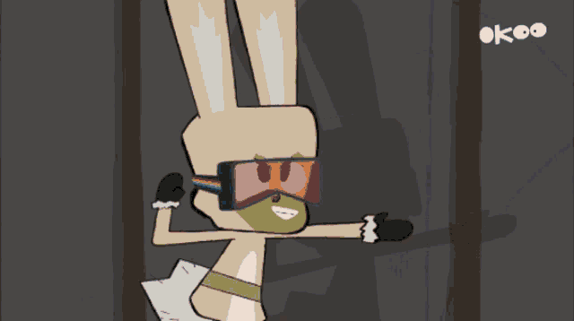 a cartoon drawing of a rocket with the letters ok on the bottom right