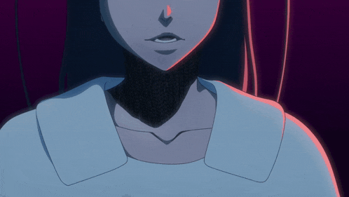 a close up of a person 's face with a blue shirt on