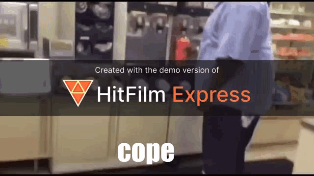 a man is standing in front of a sign that says hit film express