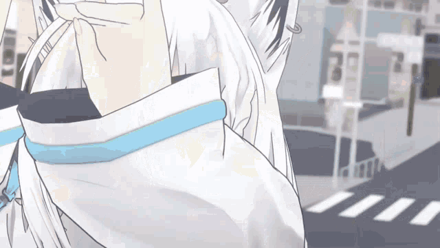 a close up of a person 's sleeve with a blue stripe on it