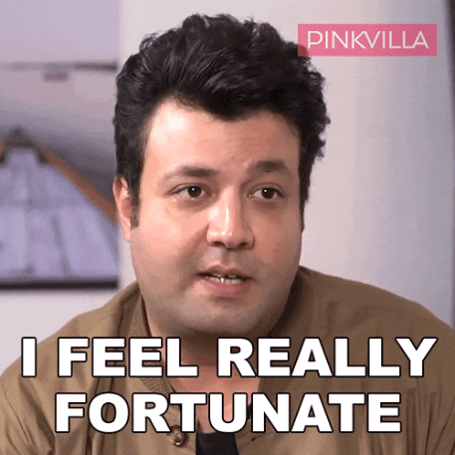 a man says " i feel really fortunate " in front of a pink villa logo