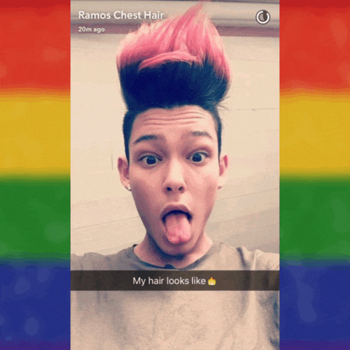 a young man with pink hair is taking a selfie and the caption says my hair looks like