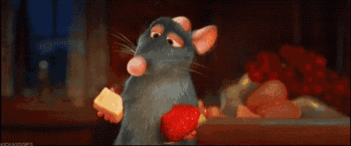 a rat from the movie ratatouille is eating a sausage sandwich .