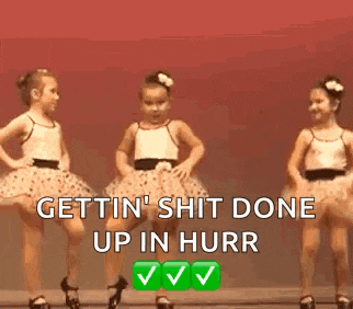two little girls are dancing together with the words `` gettin ' shit done up in hurr '' written on the bottom .