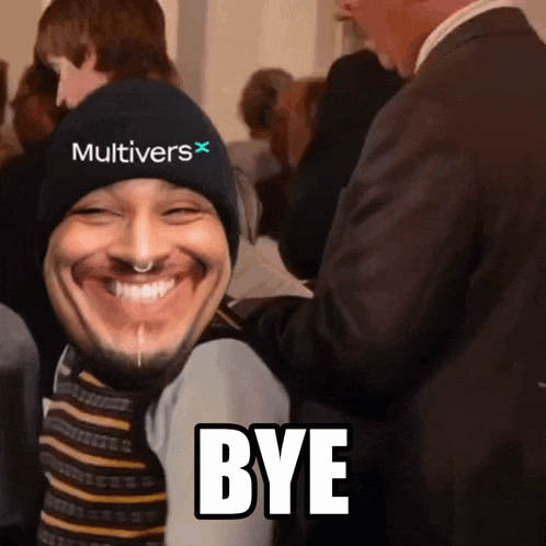 a man wearing a hat that says multivers is smiling and says bye