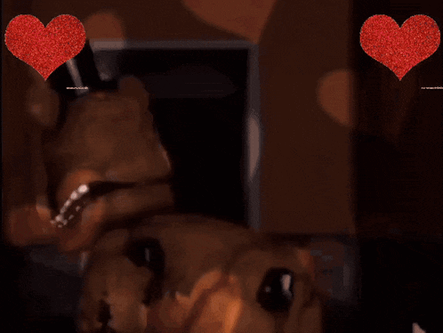 two red hearts with the words i 'm mer on the bottom
