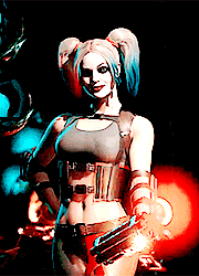 harley quinn is holding a gun in her hand