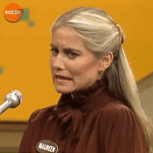 a woman with a name tag that says maureen on it
