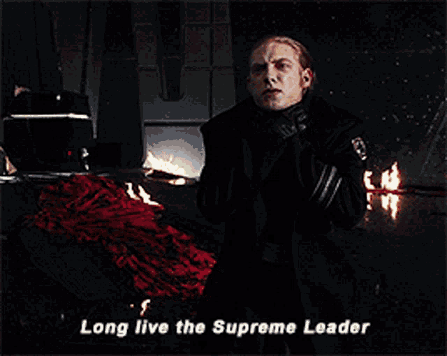 a man says " long live the supreme leader " in a movie scene