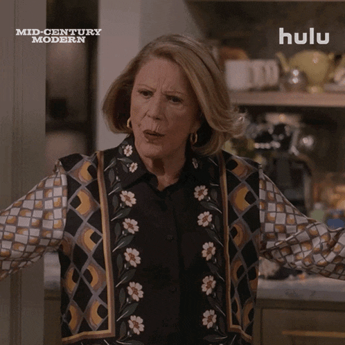 a woman says what 's going on here in front of a hulu logo