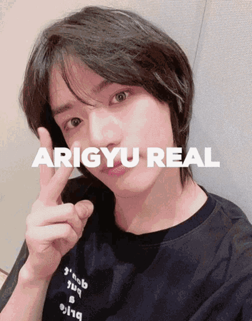 arigyu real is written on a photo of a young man