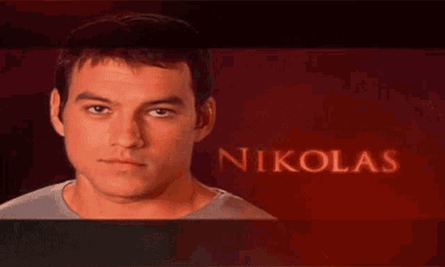 a man and a woman are standing next to each other with emily nicolas written in red