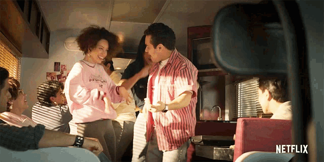 a netflix ad shows a group of people dancing in a room