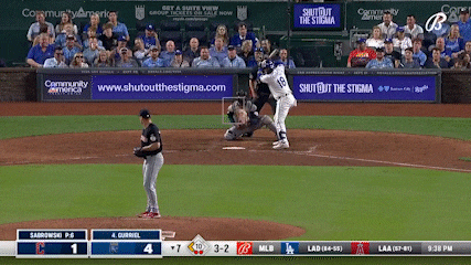 a baseball game is being played in front of a banner that says shutout the stigma