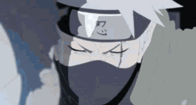 kakashi hatake is wearing a mask and a headband .