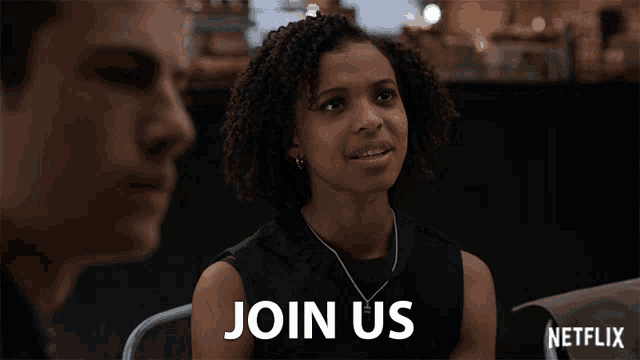 a netflix ad shows a woman talking to a man and says join us