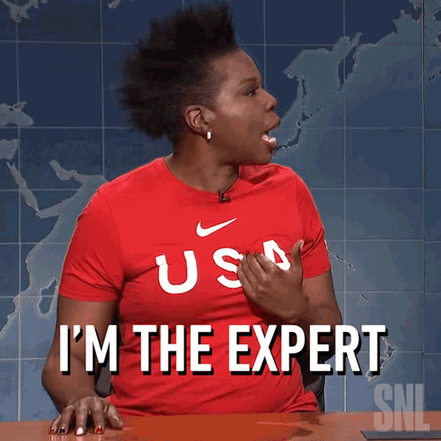 a woman wearing a red shirt with the word usa on it