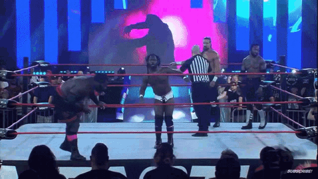 a man in a wrestling ring with the word subscribe on the bottom of the screen