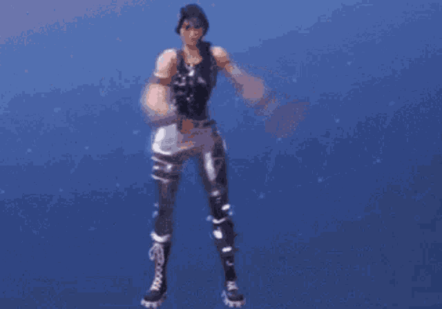 a person is dancing in the air with their arms outstretched .