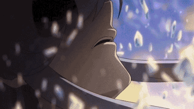 a close up of a man 's face with snow falling