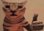 a close up of a cat giving a thumbs up .