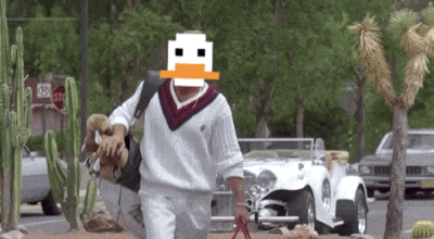 a man with a duck face on his head walks down a street with a stop sign in the background