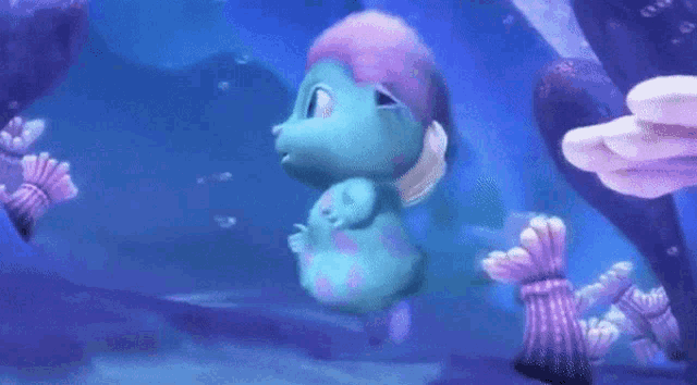 a cartoon character is swimming in the ocean with bubbles coming out of it 's mouth