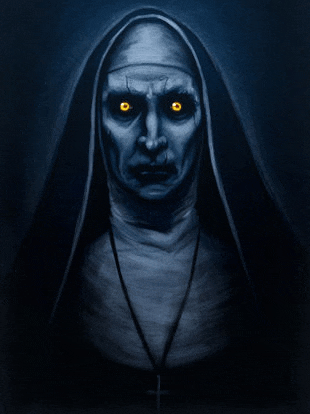 a nun with glowing eyes and a cross around her neck