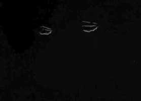 a black and white drawing of a person 's face with tears coming out of their eyes