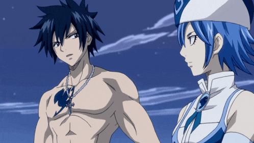 a man and a woman standing next to each other