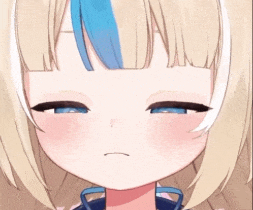 a close up of a anime girl with blonde hair and blue eyes making a face .