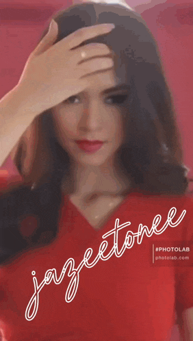 a woman in a red shirt with the name jazeetonee written on the bottom
