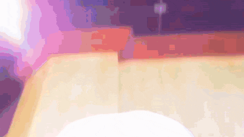 a blurry picture of a purple and orange background