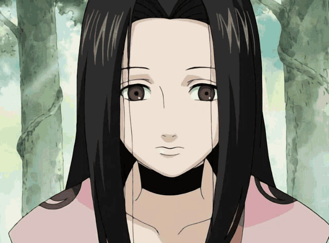 a girl with long black hair and brown eyes is standing in the woods